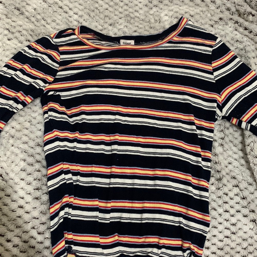 shirt from Garage,long sleeve,material is soft,size small but also stretchy!